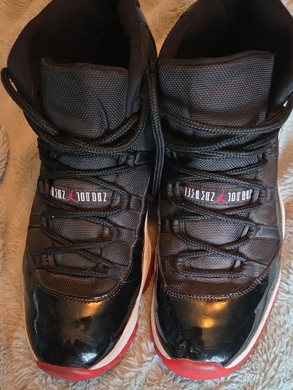 Men's Air Jordan 11 BREDS. Black and Red Colorway. Good Used Condition